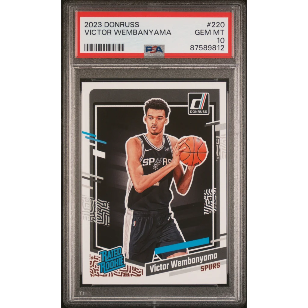 PSA graded 2023 Donruss Victor Wembanyama rookie card in black and white jersey with blue accents