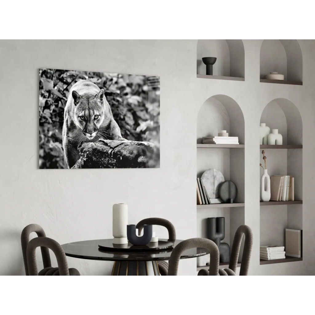 Black-and-white cougar on rock framed glass wall art