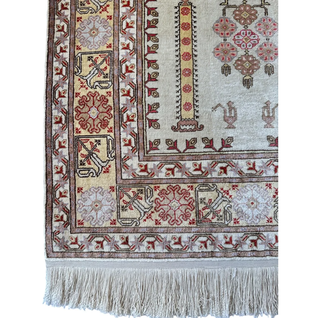 Vintage Kayseri silk rug from Turkey, close-up of geometric and floral motifs in warm natural tones