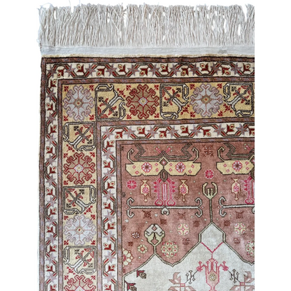 Pure silk Turkish Kayseri rug with handwoven geometric floral patterns