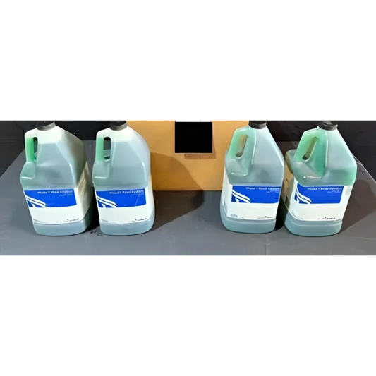 Four translucent plastic jugs of PureForce Phase rinse additive for warewashing machines