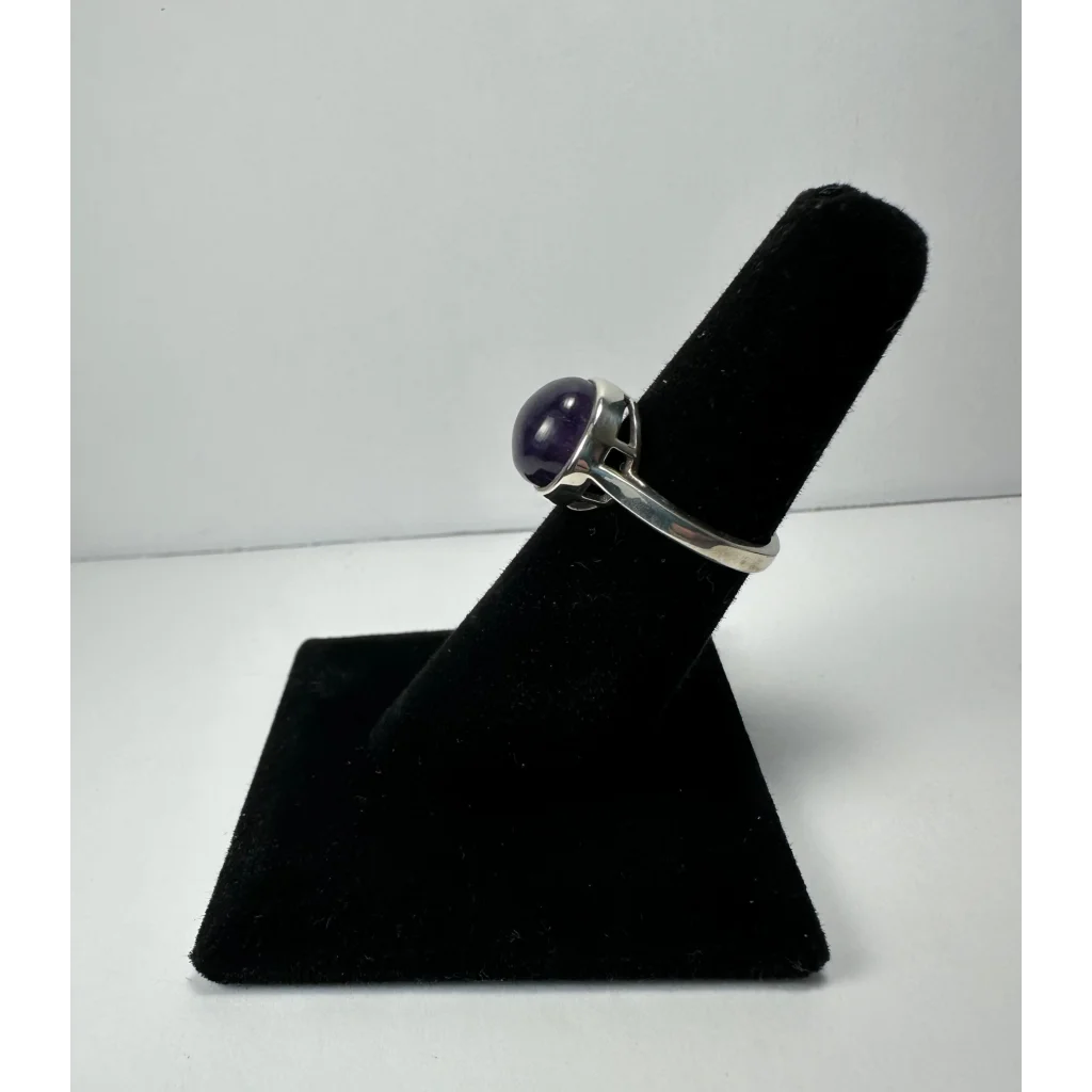 Sleek silver amethyst ring with minimalist purple gem bezel