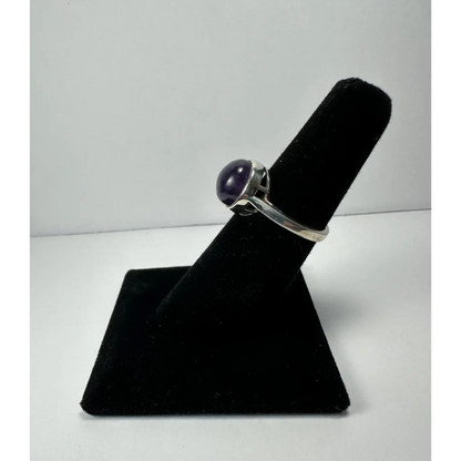 Sleek silver amethyst ring with minimalist purple gem bezel
