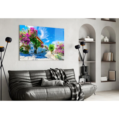 Purple Bougainvillea wall art with leather couch and checkered blanket