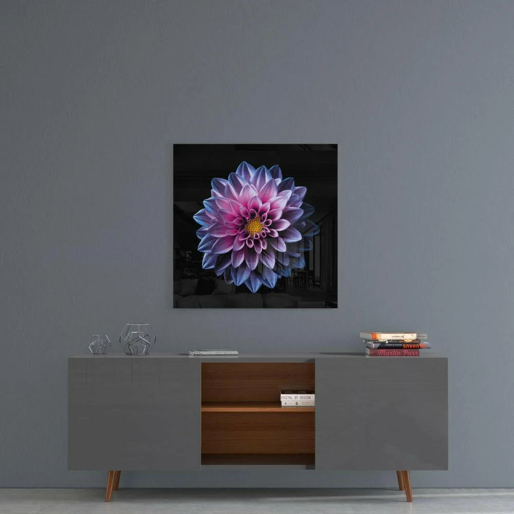 Vibrant purple pink dahlia glass wall art with yellow center in black frame