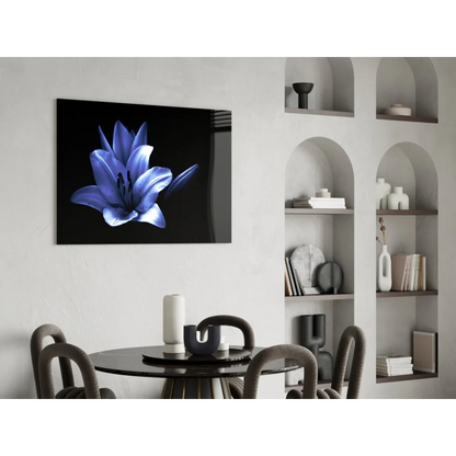 Stunning blue lily glass wall art on sleek black canvas in modern interior