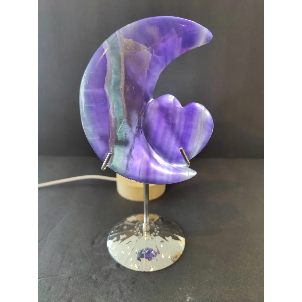Purple fluorite half-moon and heart sculpture in teal and purple agate on 5 inch metal stand