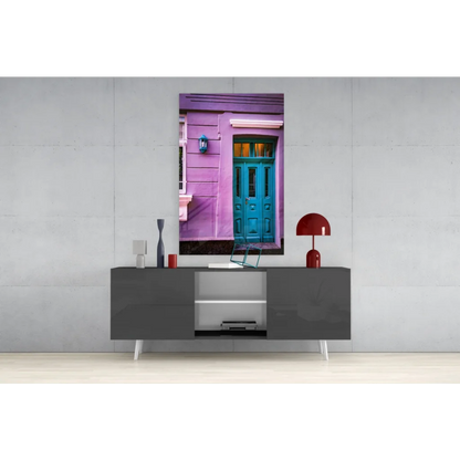 Vibrant purple teal door glass wall art on gray console