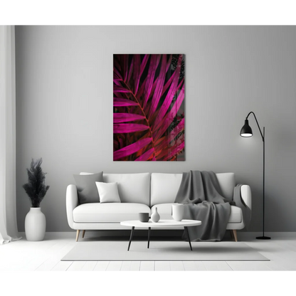 Vibrant magenta palm glass wall art on gray wall