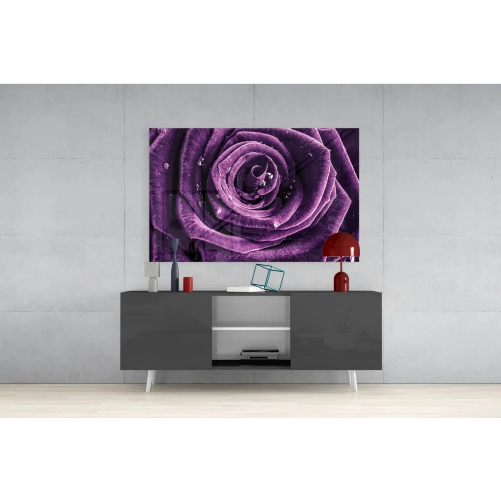 Vibrant purple rose dew drops glass wall art print above gray console