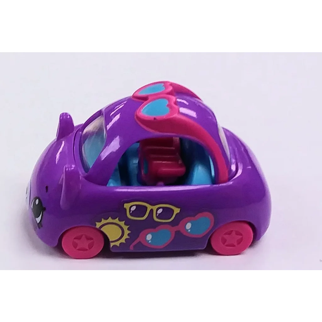 Purple Shopkins Cutie Car Happy Meal toy with sunglasses and stars