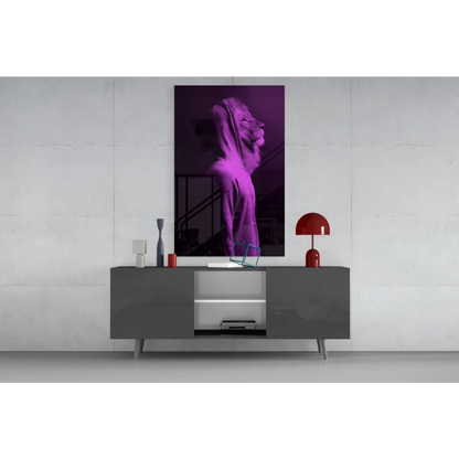 Purple silhouette wall art print on gray sideboard with red accents