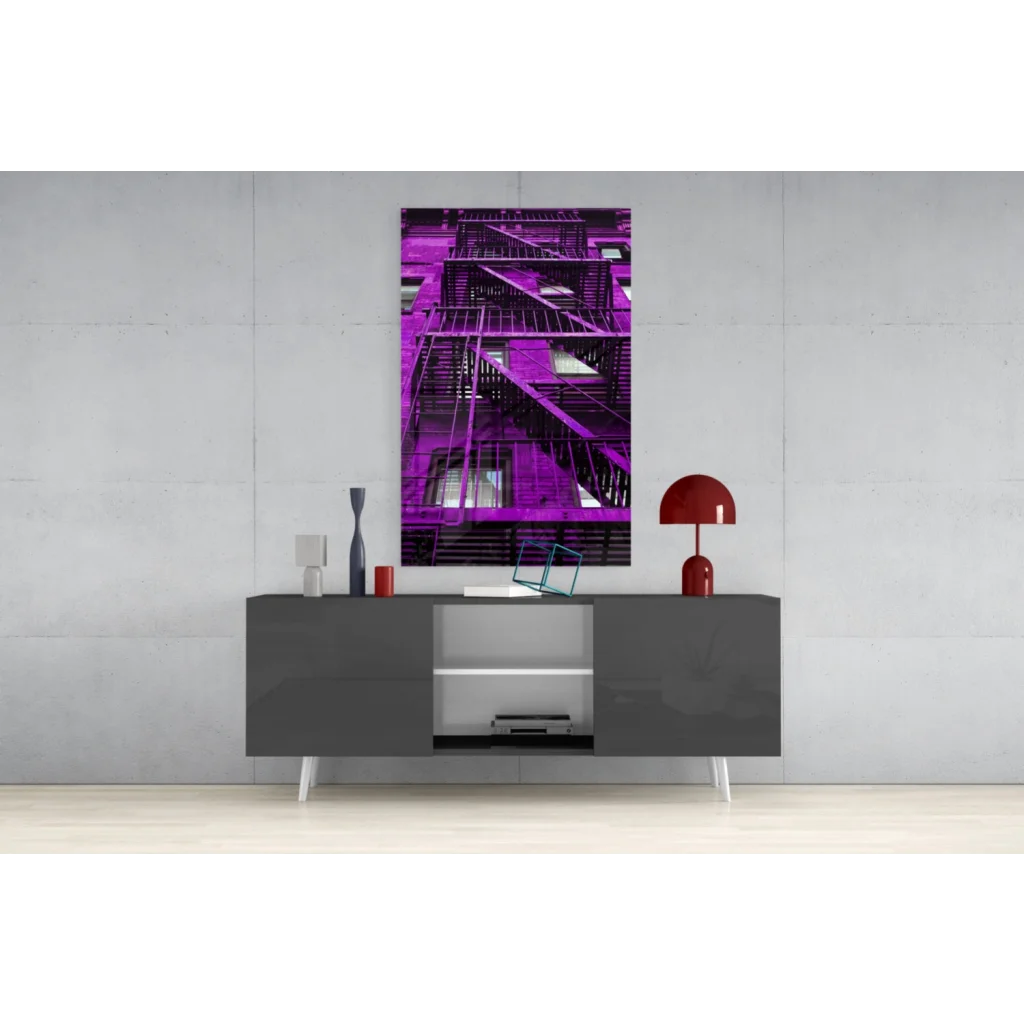 Vibrant purple fire escape glass wall art on gray console table