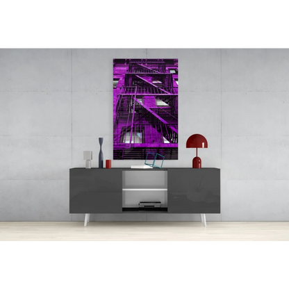 Vibrant purple fire escape glass wall art on gray console table