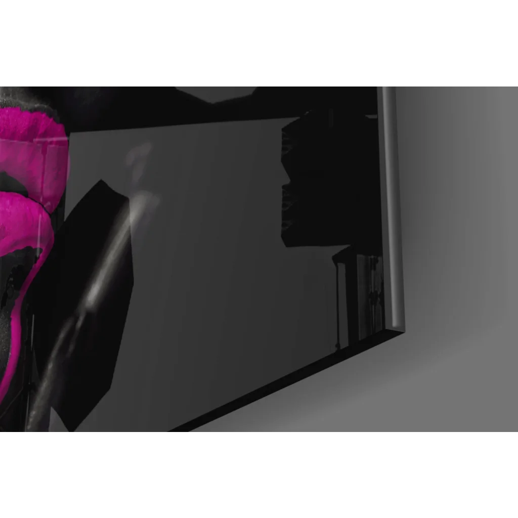 Sleek black smartphone with pink drip accent in wall art