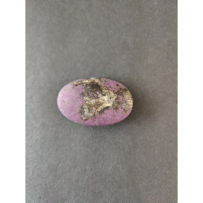 Smooth oval purple Purpurite Lapidary gemstone with brown white inclusions