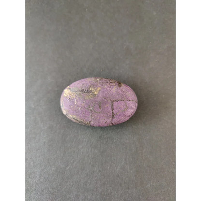 Smooth oval purple jasper stone with golden veining in Purpurite Lapidary