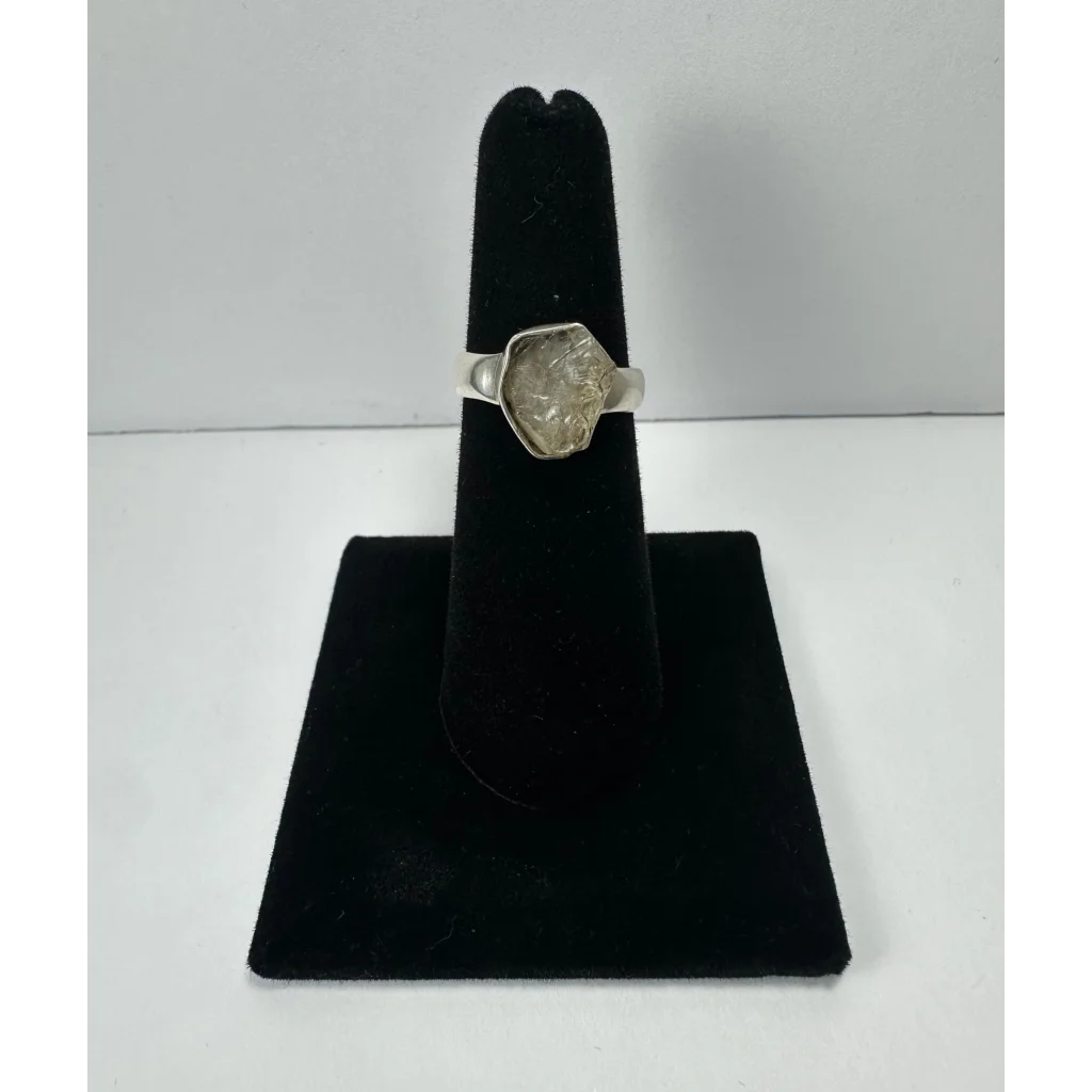 Silver quartz ring with raw faceted citrine gemstone on simple band