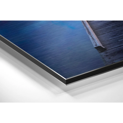 Stunning brushed aluminium dibond print of serene blue water with wooden dock