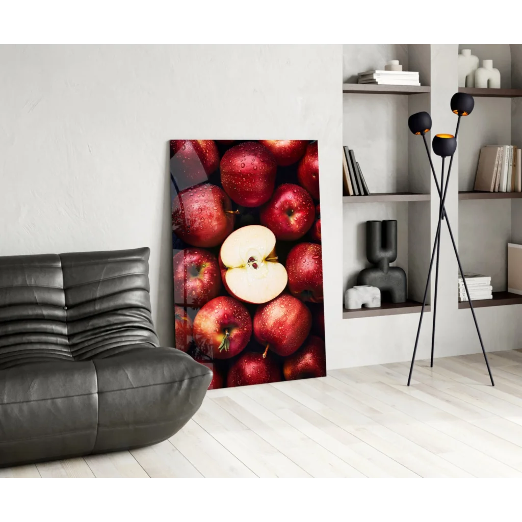 Vibrant juicy red apple glass wall art with dew drops and halved fruit on sleek canvas
