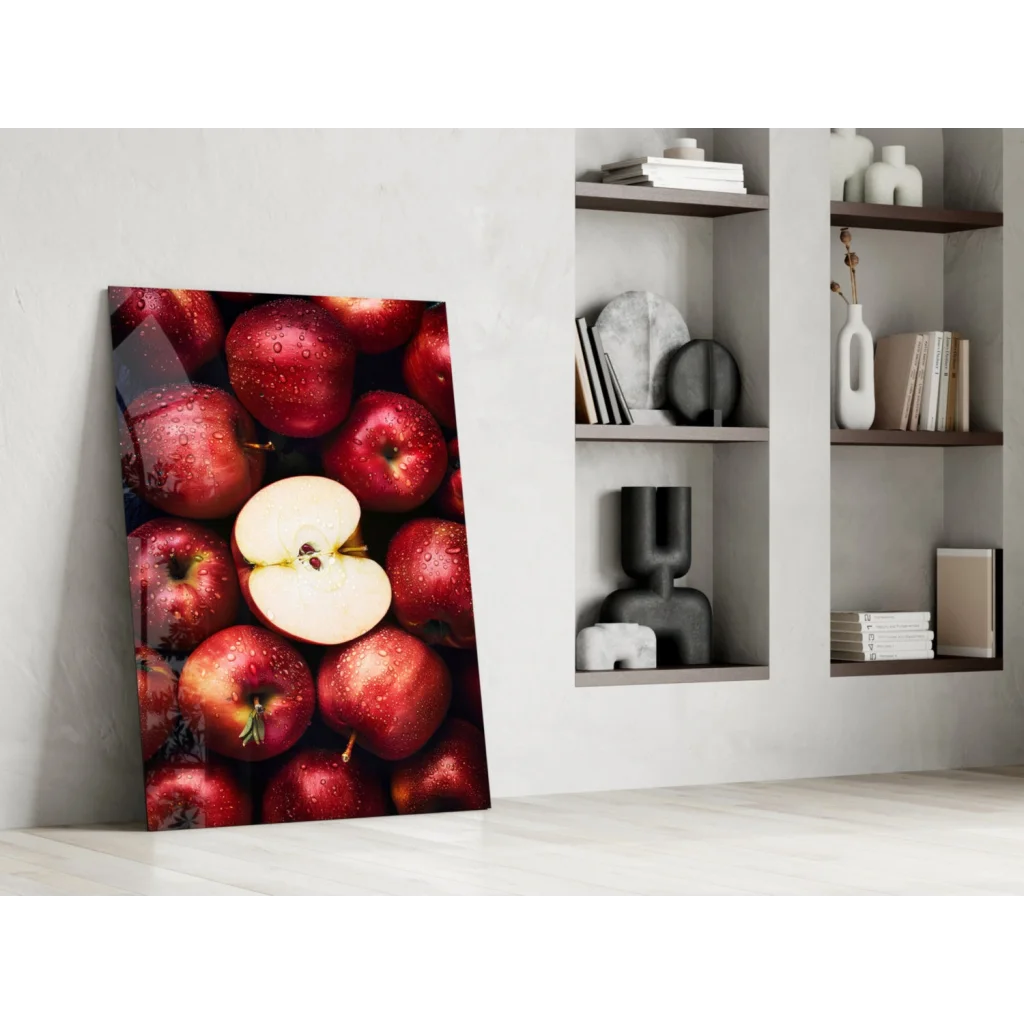 Juicy red apple glass wall art with glossy dewy finish on white wall