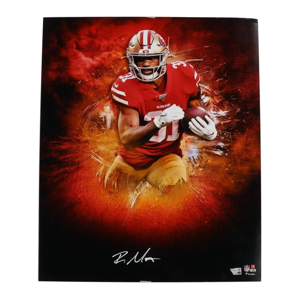 Vibrant signed 49ers matted photo of Raheem Mostert in a red uniform holding a football