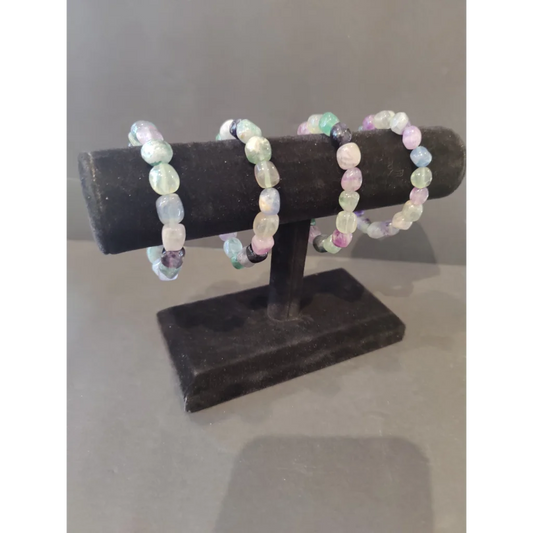 Three rainbow fluorite beaded bracelets in dreamy pastel pink, green, lavender