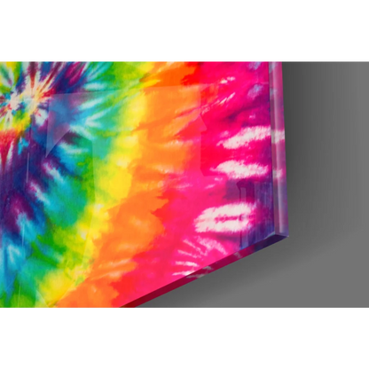 Psychedelic rainbow spiral glass wall art with vibrant tie-dye swirls