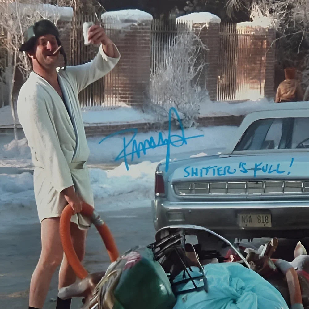 Randy Quaid as Cousin Eddie in Christmas Vacation, raising glass with vacuum hose