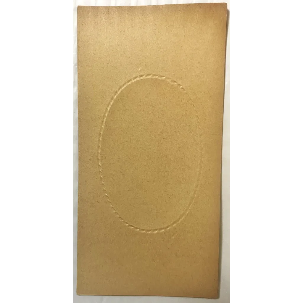 Tan paper with embossed oval on a Rare 1800s Beauty Candy Box top showing historic charm