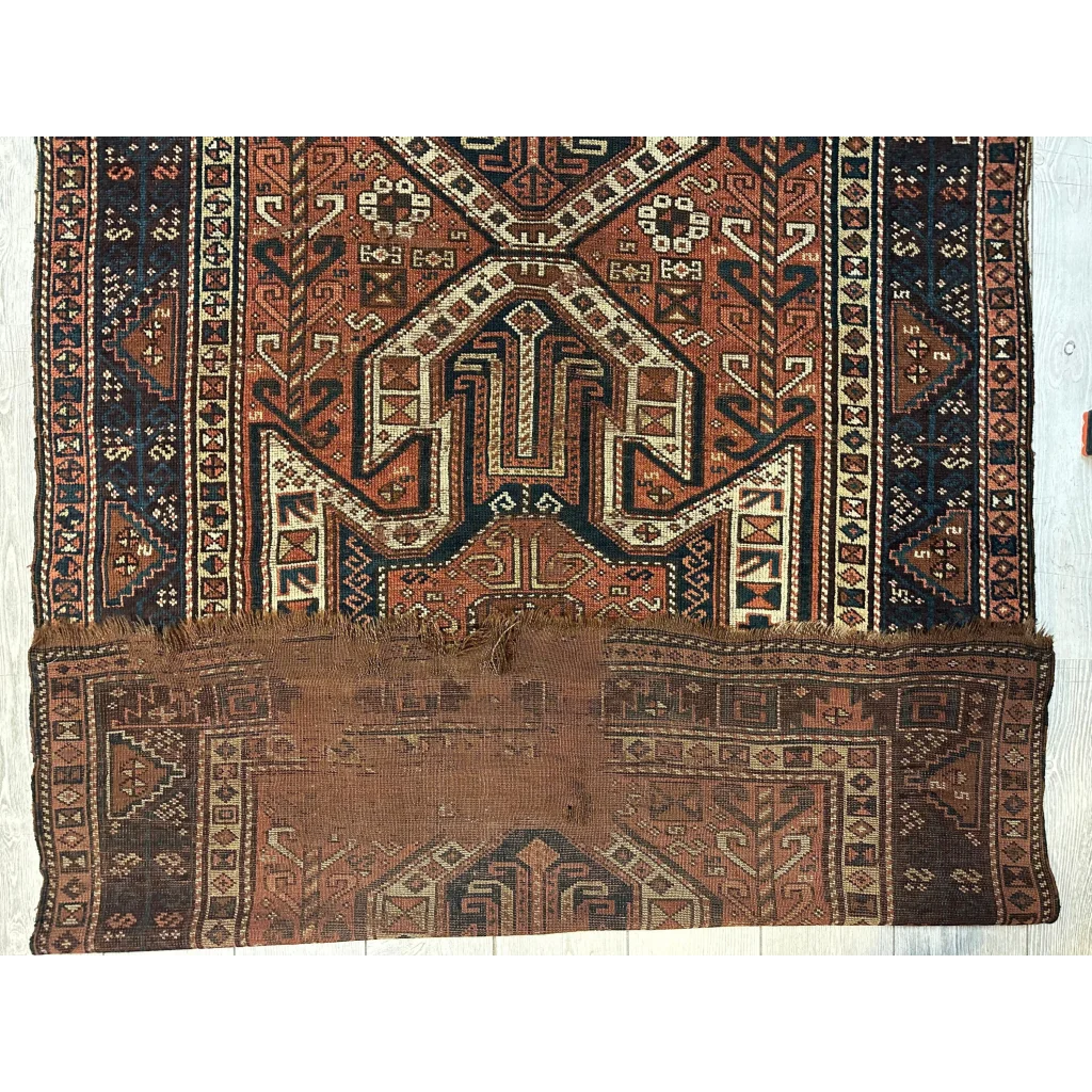 Rare 1875 Caucasian Kazak runner with wool pile geometric patterns
