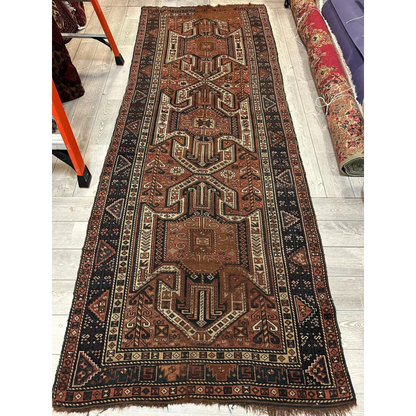1875 Caucasian Kazak Sewan wool runner, border detail with geometric motifs, antique aged patina