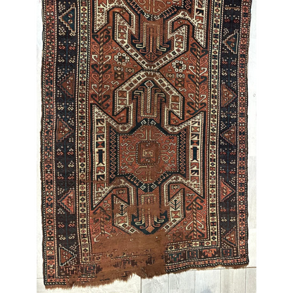 Rare 1875 Kazak runner Caucasian, field pattern close-up in red geometric design, all-wool construction
