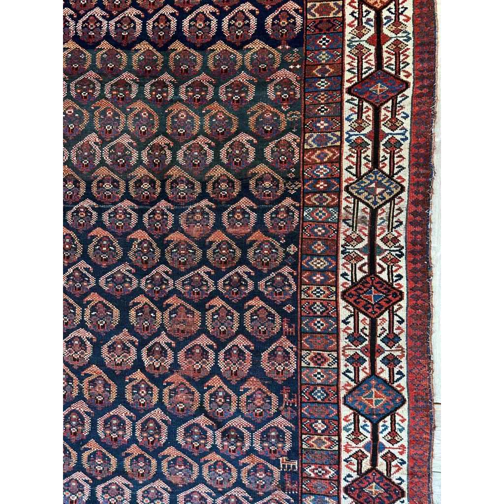 Rare 1880s Persian Afshar rug with navy hexagonal motifs in rust and cream