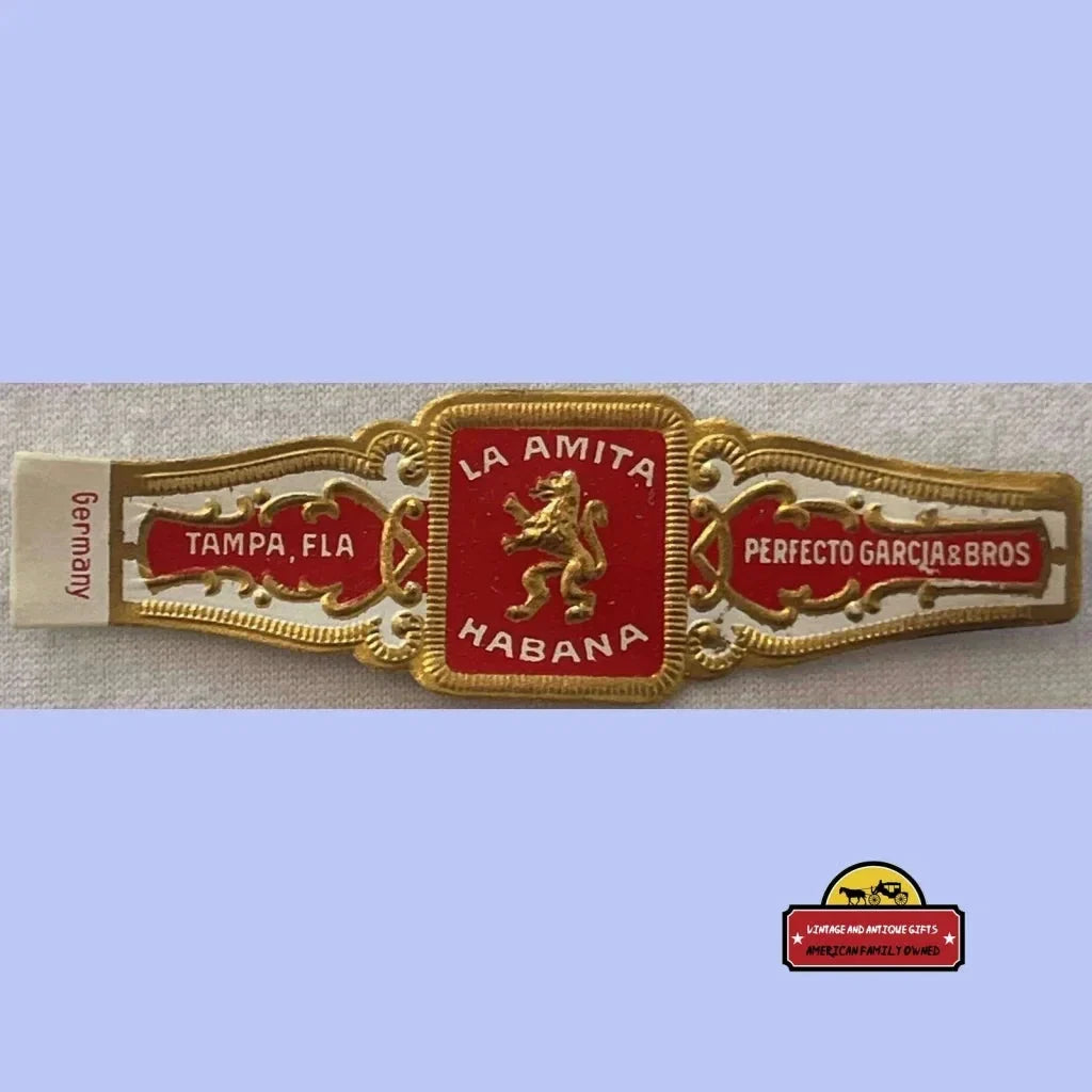 Ornate cigar band of Antique Vintage La Amita Habana with golden lion emblem