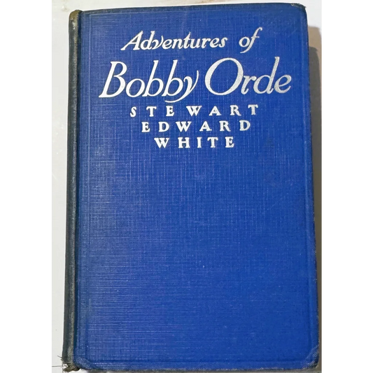 Blue hardcover book with white title text from Stewart Edward White’s Bobby Orde series