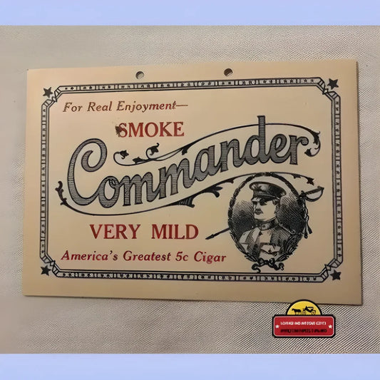 Vintage Commander Cigar sign with ornate lettering and a soldier’s portrait, 1920s antique