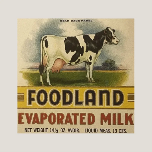 Vintage Foodland evaporated milk label from the 1920s with cow farm decor vibe