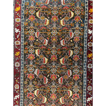 1920s Persian Kashkuli rug, dark blue ground with intricate geometric floral field patterns, hand-knotted