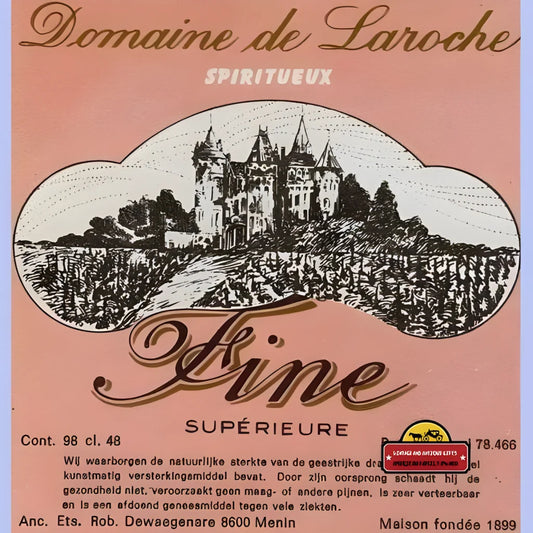 Vintage Laroche Spiritueux label with a stunning chateau and vineyard illustration