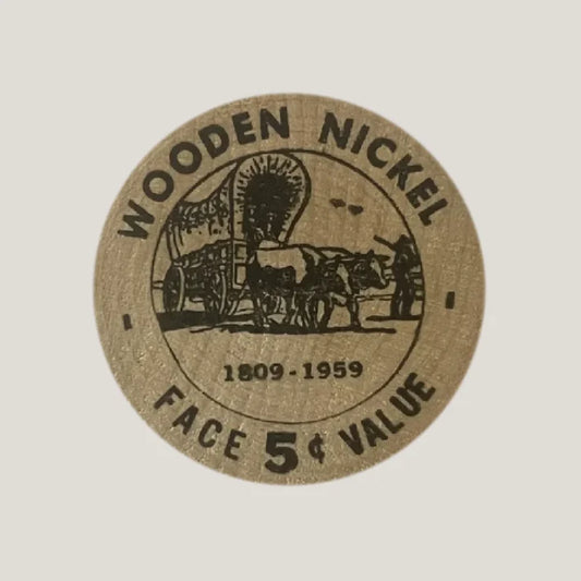 Vintage 1950s wooden nickel coin from Brownlee Moore Bank Security State gift