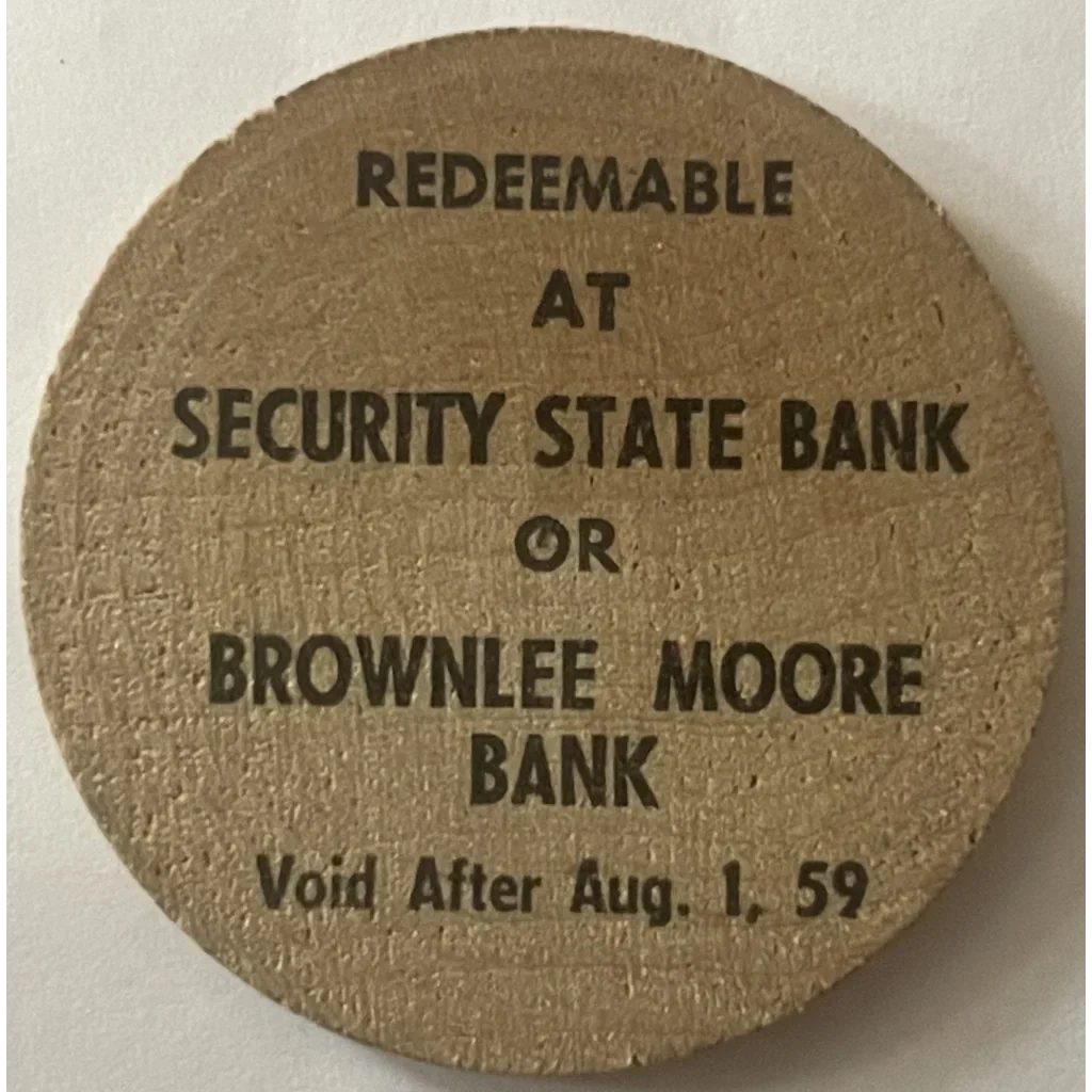 Circular 1950s wooden nickel displaying redeemable bank info until August 1, 1959