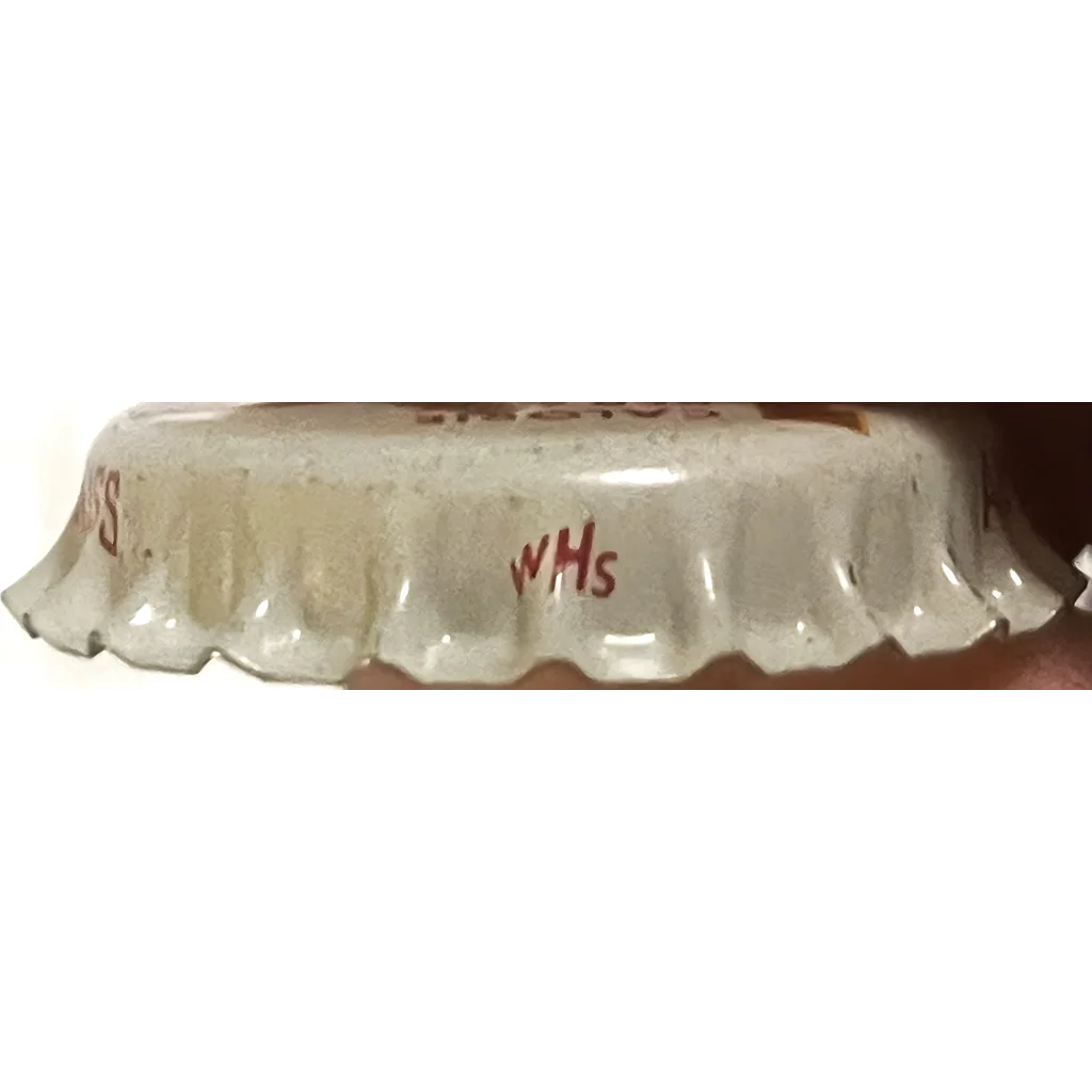 Bottle cap with crimped edges featuring WMS, perfect for Frostie Root Beer collectors