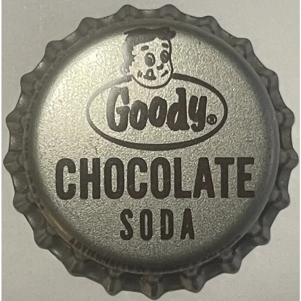 Metal bottle cap featuring Goody Chocolate Soda and a smiling cartoon face logo