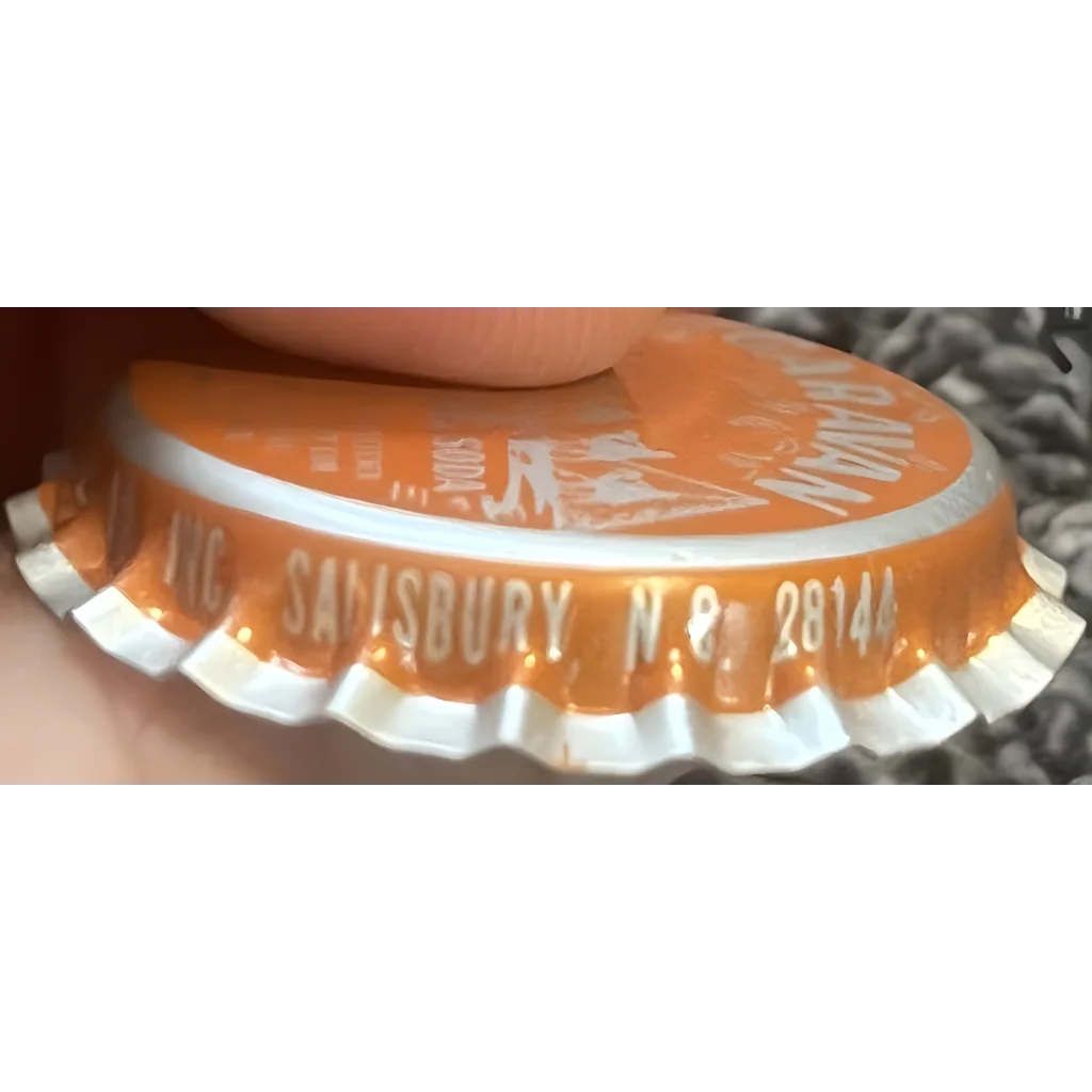 Orange soda bottle cap with Simsbury 28147, a cool find from a 1970s Caravan