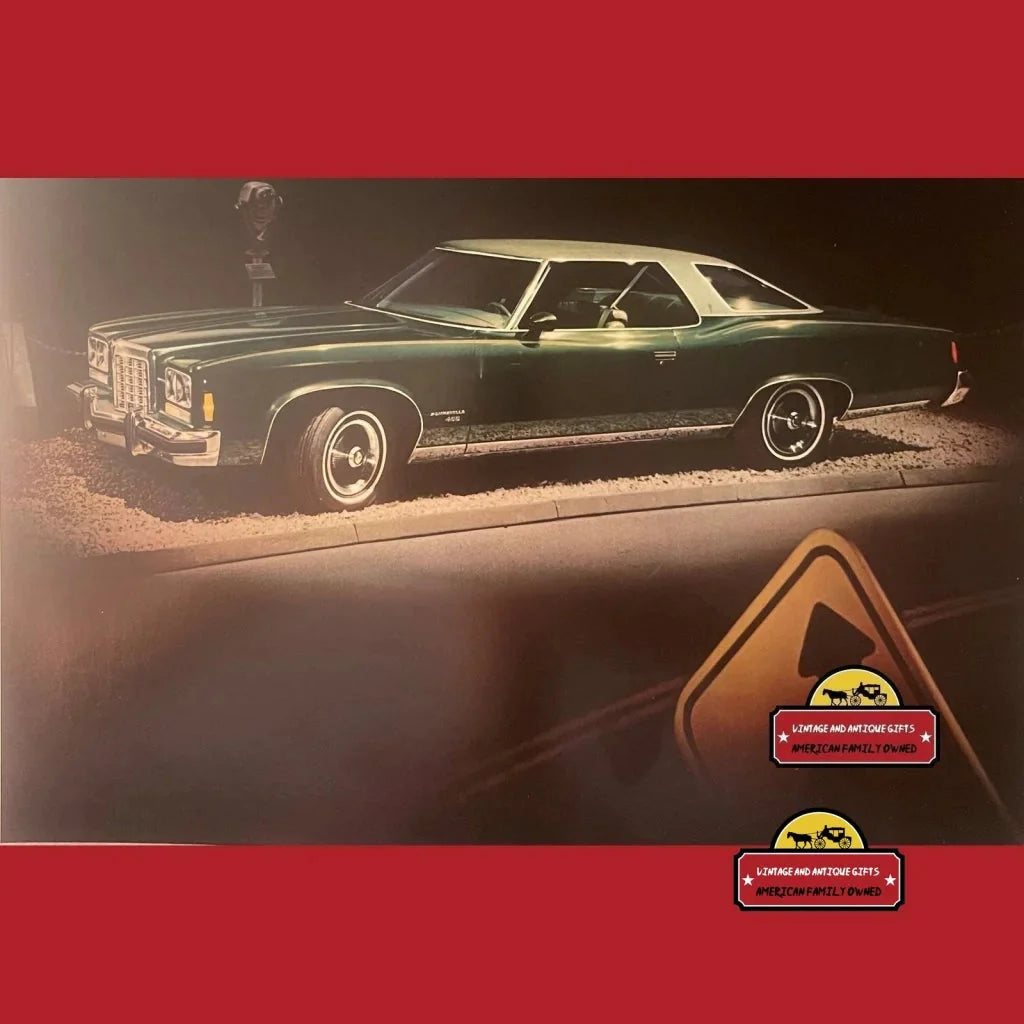 Classic dark green 1970s Pontiac Grand Prix featured in Pontiac Bonneville dealer brochure