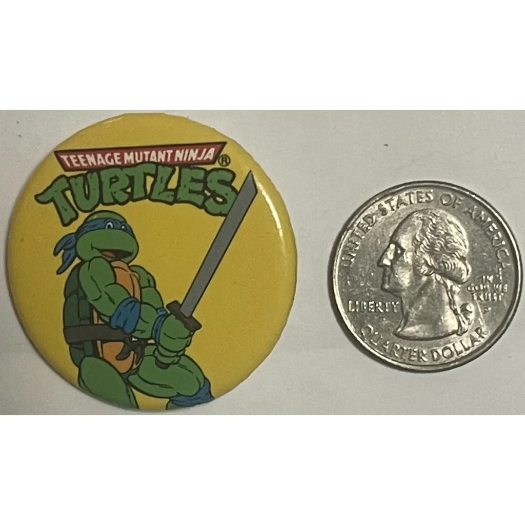 Circular yellow button showcasing Leonardo from the Ninja Turtles Movie