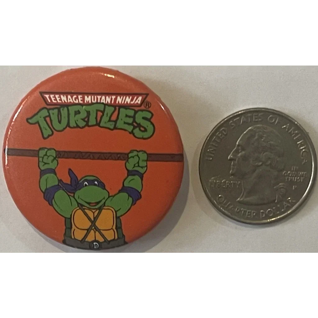 Circular pin featuring Donatello from the Rare 1990 Ninja Turtles Movie collectible