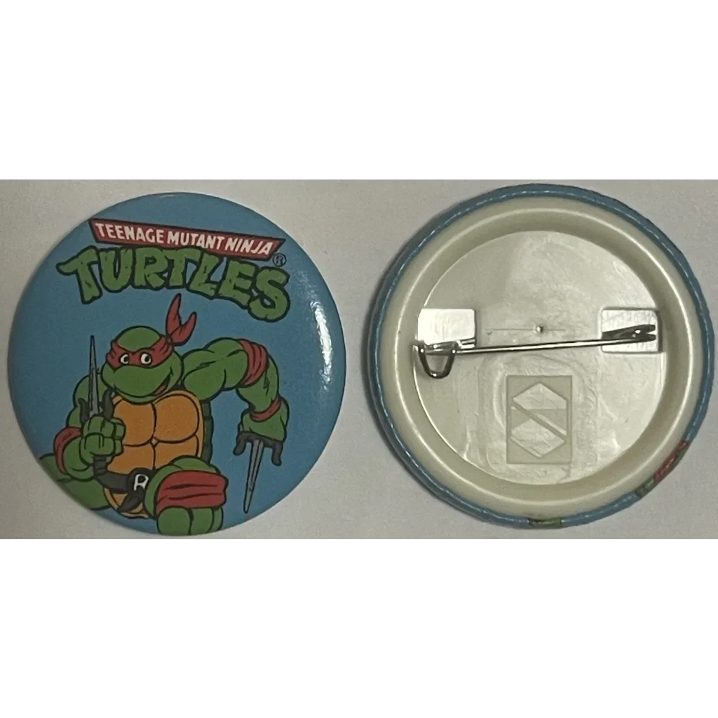 Teenage Mutant Ninja Turtles pin-back button showcasing Raphael design and backing