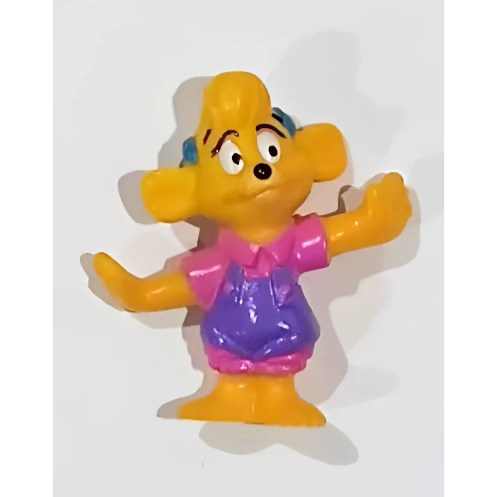 Rare 1991 Disney PVC Molly Cunningham TaleSpin figure, yellow purple toy dog with blue eyes, pink bow tie